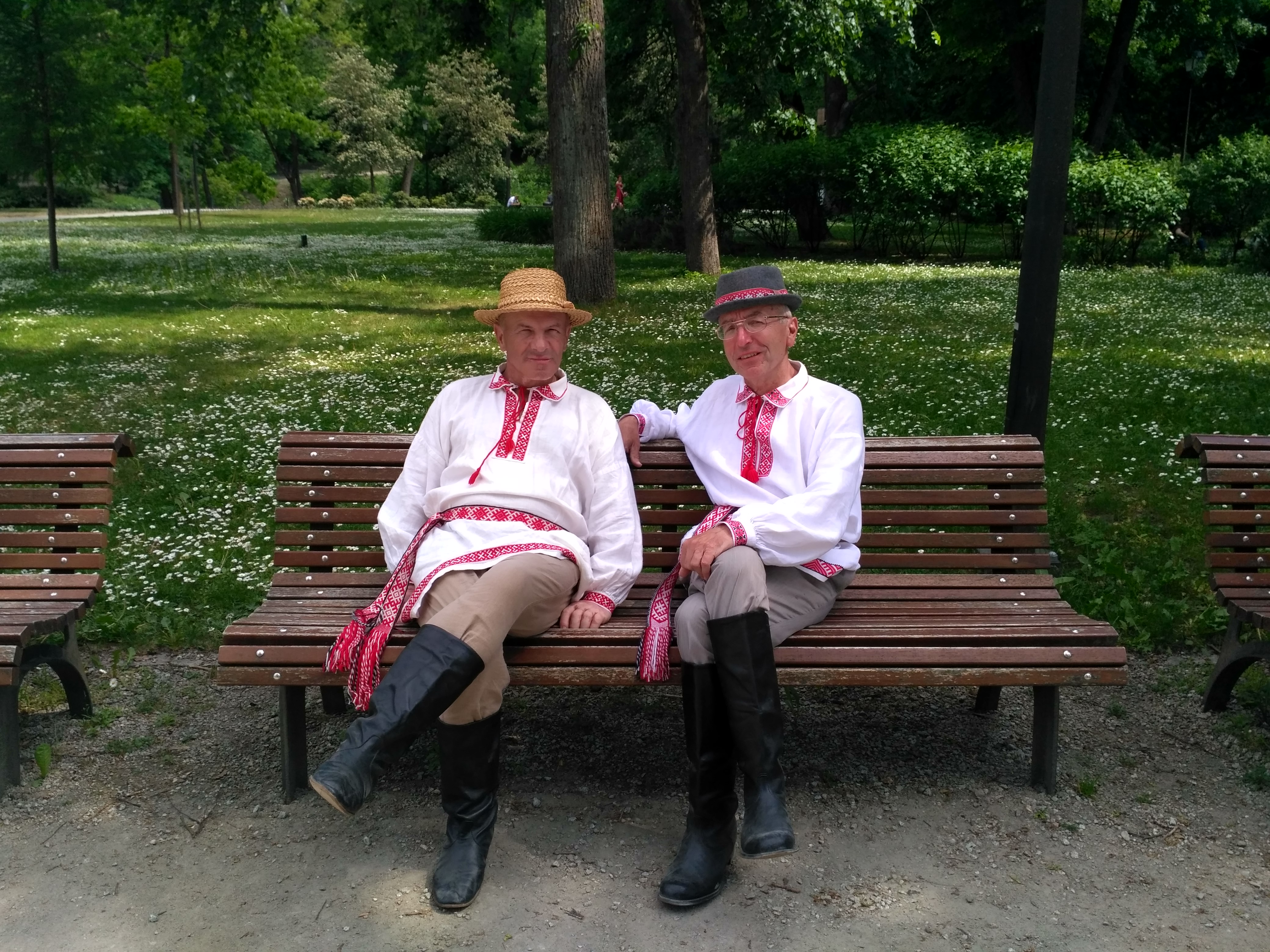 men dressed in folk costumes vilnius old town
