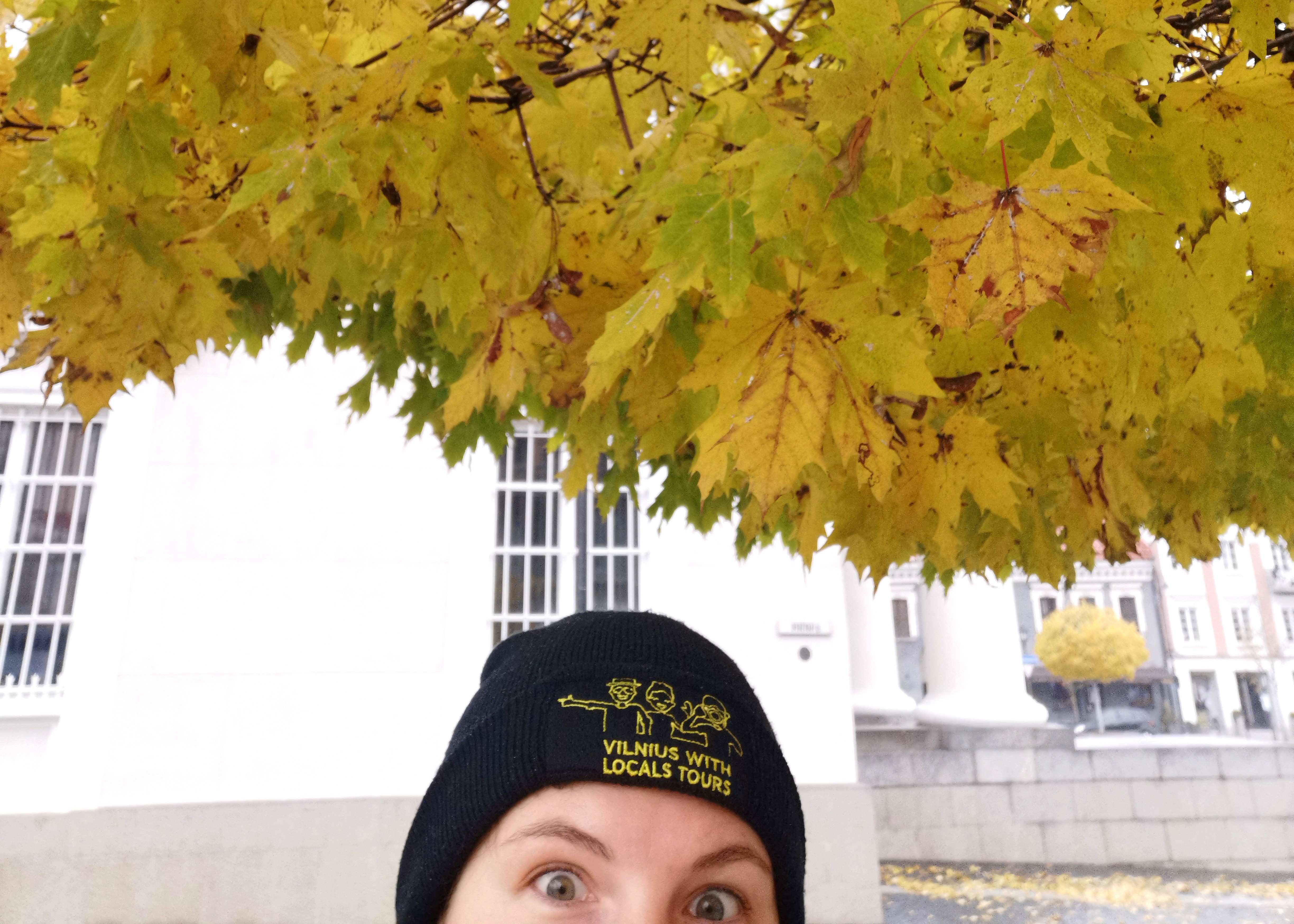 vilnius with lcoals guide yellow leaves old town fall