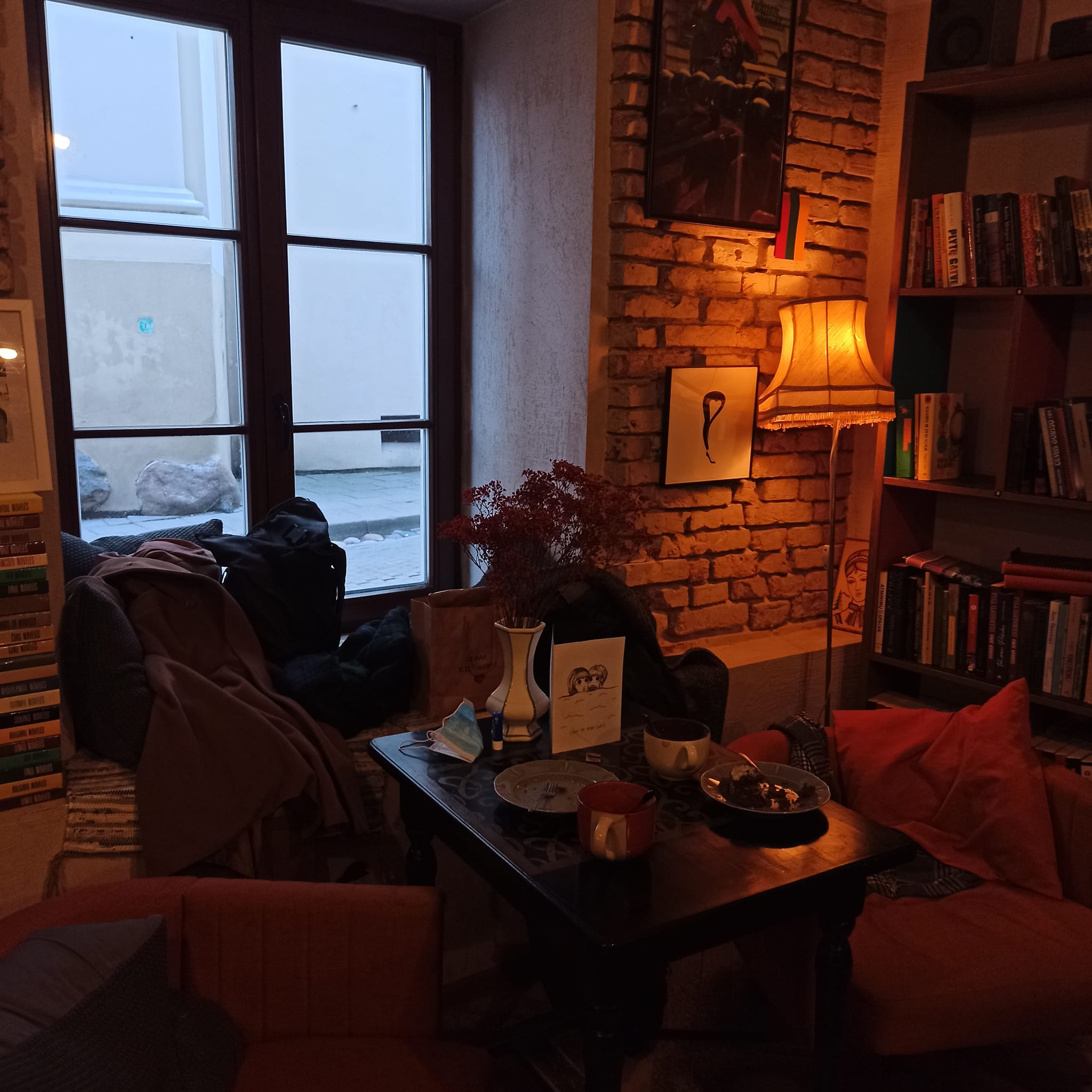 independent bookstore-cafe in Vilnius lithuania one autumn evening