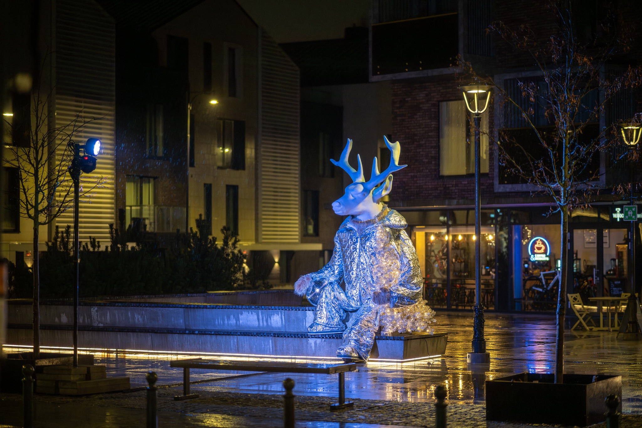 Christmas raindeer statue decoration in urban city square 